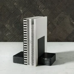 Fermalibri Pietra L08 in marmo Nero Marquinia di Piero Lissoni