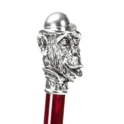 Ombrello a righe con manico in argento a forma di scimmia