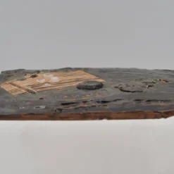 Piatto decorativo nero e arancione
