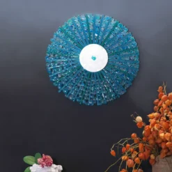 Scultura da parete in vetro azzurro Radiale