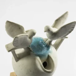 Scultura Fontanella in gres bianco maculato effetto granito