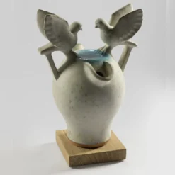 Scultura Fontanella in gres bianco maculato effetto granito