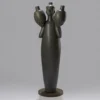 Scultura Portatore Tevere in gres smaltato bruno
