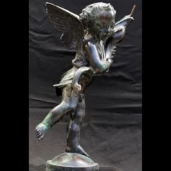 Scultura Putto con Delfino in Bronzo Verde
