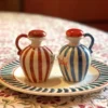 Set di bottiglie di olio e aceto in ceramica rossa