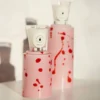 Set di 2 portacandele rosa con 4 candele fragranza melograno