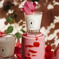 Set di 2 portacandele rosa con 4 candele fragranza melograno