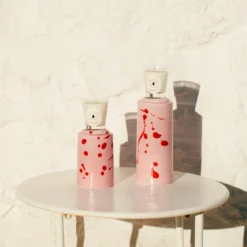 Set di 2 portacandele rosa con 4 candele fragranza melograno