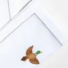 Set di tovagliette e tovagliolo con anatre