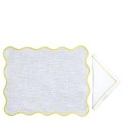 Set di tovagliette e tovaglioli gialli e bianchi