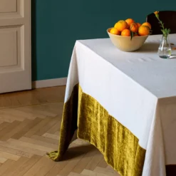 Tovaglia in lino naturale oro con bordo in velluto