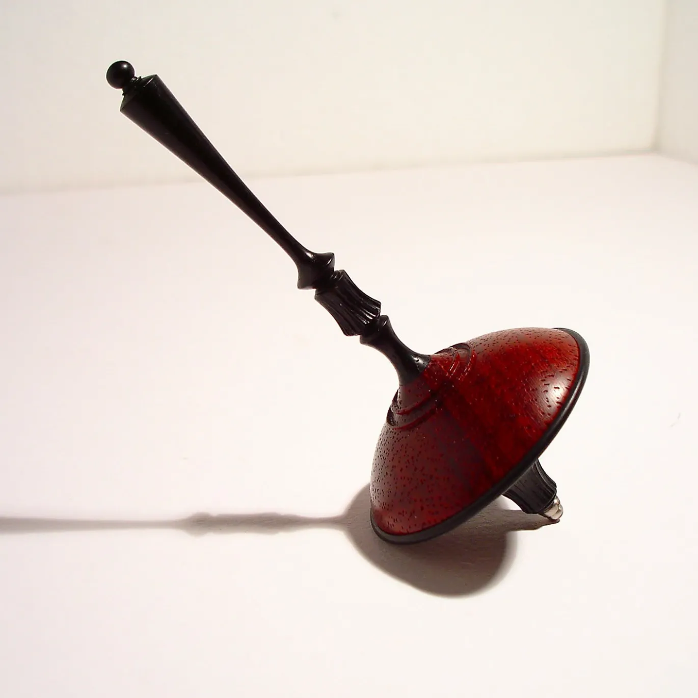 Trottola in ebano e padauk