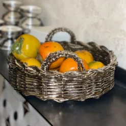 Vassoio decorativo rotondo in metallo placcato intrecciato