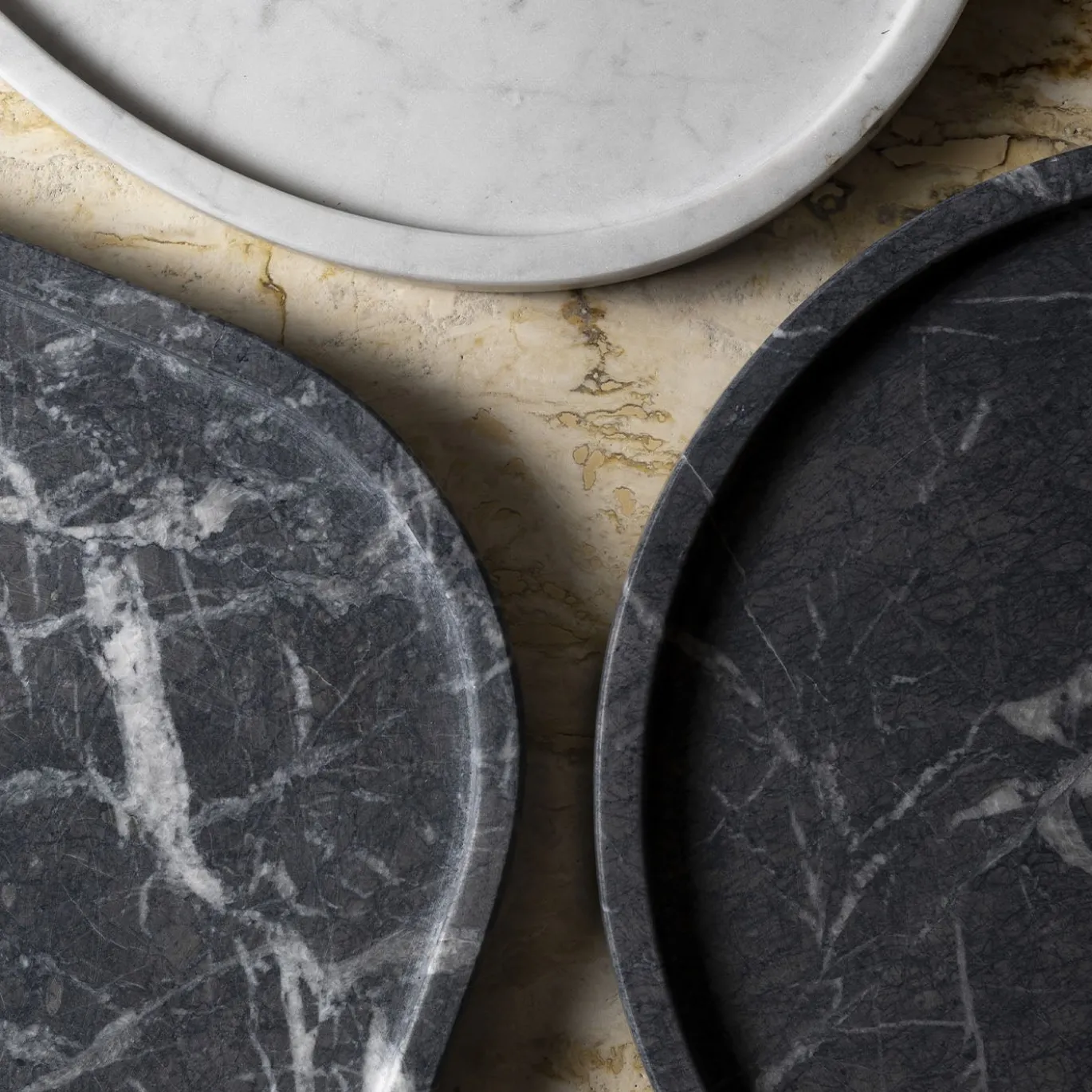 Vassoio rotondo in marmo nero Marquina