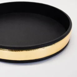 Vassoio rotondo in pelle a righe Deco